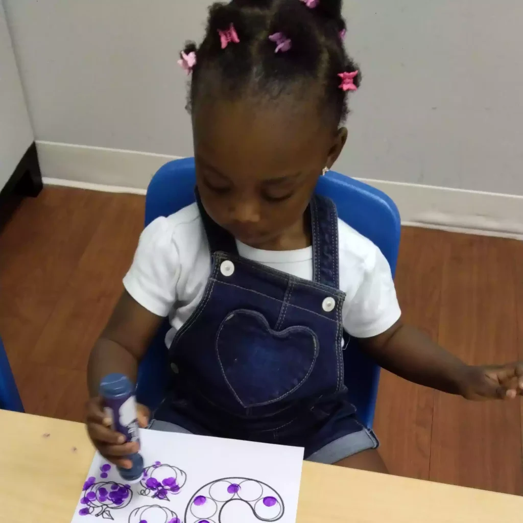 Pinebrook Montessori student coloring number worksheet